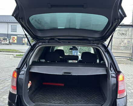 Черный Опель Астра, объемом двигателя 1.69 л и пробегом 328 тыс. км за 4500 $, фото 4 на Automoto.ua