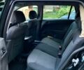 Черный Опель Астра, объемом двигателя 1.6 л и пробегом 205 тыс. км за 5000 $, фото 1 на Automoto.ua