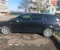 Черный Опель Астра, объемом двигателя 1.7 л и пробегом 282 тыс. км за 5000 $, фото 2 на Automoto.ua