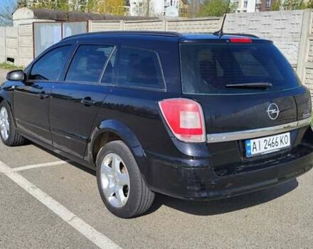 Черный Опель Астра, объемом двигателя 1.6 л и пробегом 319 тыс. км за 4500 $, фото 7 на Automoto.ua
