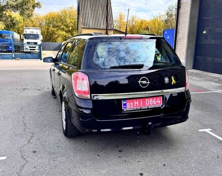 Черный Опель Астра, объемом двигателя 1.6 л и пробегом 234 тыс. км за 5600 $, фото 2 на Automoto.ua