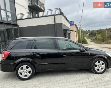 Черный Опель Астра, объемом двигателя 1.6 л и пробегом 250 тыс. км за 4399 $, фото 16 на Automoto.ua