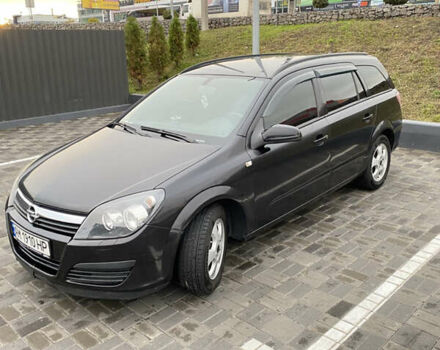Чорний Опель Астра, об'ємом двигуна 1.25 л та пробігом 202 тис. км за 4500 $, фото 1 на Automoto.ua
