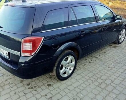 Черный Опель Астра, объемом двигателя 1.7 л и пробегом 240 тыс. км за 5500 $, фото 6 на Automoto.ua