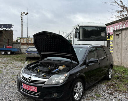Черный Опель Астра, объемом двигателя 1.6 л и пробегом 208 тыс. км за 5600 $, фото 45 на Automoto.ua