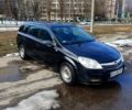 Черный Опель Астра, объемом двигателя 1.2 л и пробегом 230 тыс. км за 3950 $, фото 1 на Automoto.ua