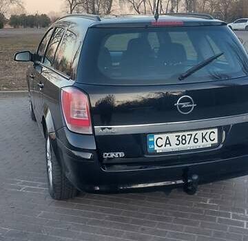Черный Опель Астра, объемом двигателя 1.6 л и пробегом 231 тыс. км за 5800 $, фото 5 на Automoto.ua