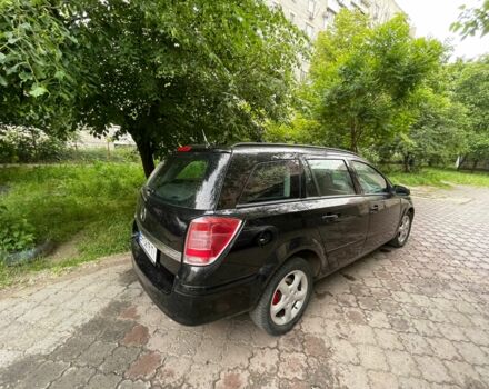 Черный Опель Астра, объемом двигателя 1.6 л и пробегом 264 тыс. км за 5000 $, фото 3 на Automoto.ua