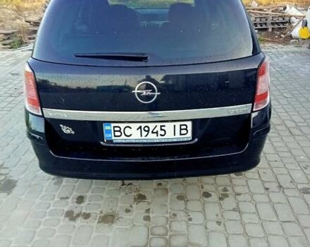 Черный Опель Астра, объемом двигателя 1.7 л и пробегом 240 тыс. км за 5500 $, фото 7 на Automoto.ua