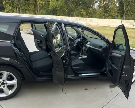 Черный Опель Астра, объемом двигателя 1.9 л и пробегом 270 тыс. км за 5200 $, фото 14 на Automoto.ua