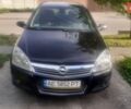 Черный Опель Астра, объемом двигателя 1.6 л и пробегом 260 тыс. км за 4600 $, фото 1 на Automoto.ua