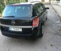 Черный Опель Астра, объемом двигателя 1.6 л и пробегом 227 тыс. км за 5100 $, фото 6 на Automoto.ua