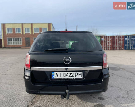 Черный Опель Астра, объемом двигателя 1.6 л и пробегом 239 тыс. км за 5350 $, фото 8 на Automoto.ua