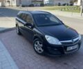 Черный Опель Астра, объемом двигателя 1.2 л и пробегом 296 тыс. км за 4350 $, фото 1 на Automoto.ua