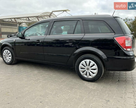 Черный Опель Астра, объемом двигателя 1.6 л и пробегом 223 тыс. км за 5750 $, фото 4 на Automoto.ua