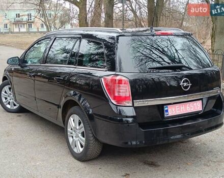 Черный Опель Астра, объемом двигателя 1.8 л и пробегом 238 тыс. км за 6050 $, фото 14 на Automoto.ua