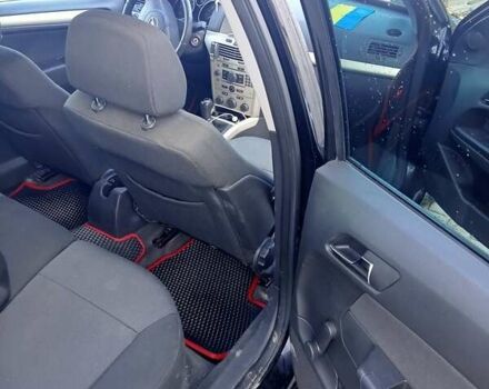 Черный Опель Астра, объемом двигателя 1.7 л и пробегом 240 тыс. км за 5500 $, фото 1 на Automoto.ua