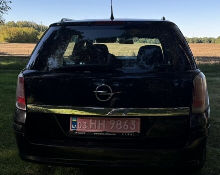Черный Опель Астра, объемом двигателя 1.6 л и пробегом 228 тыс. км за 4450 $, фото 7 на Automoto.ua