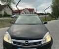 Черный Опель Астра, объемом двигателя 1.69 л и пробегом 203 тыс. км за 4499 $, фото 1 на Automoto.ua