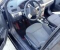 Черный Опель Астра, объемом двигателя 1.7 л и пробегом 240 тыс. км за 5500 $, фото 1 на Automoto.ua
