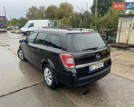Черный Опель Астра, объемом двигателя 1.69 л и пробегом 300 тыс. км за 4500 $, фото 15 на Automoto.ua