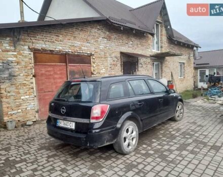 Черный Опель Астра, объемом двигателя 1.7 л и пробегом 237 тыс. км за 5100 $, фото 12 на Automoto.ua