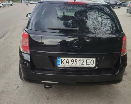 Черный Опель Астра, объемом двигателя 1.6 л и пробегом 233 тыс. км за 3399 $, фото 4 на Automoto.ua