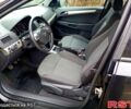 Черный Опель Астра, объемом двигателя 1.7 л и пробегом 220 тыс. км за 4999 $, фото 5 на Automoto.ua