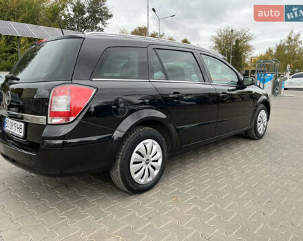 Черный Опель Астра, объемом двигателя 1.6 л и пробегом 223 тыс. км за 5750 $, фото 17 на Automoto.ua