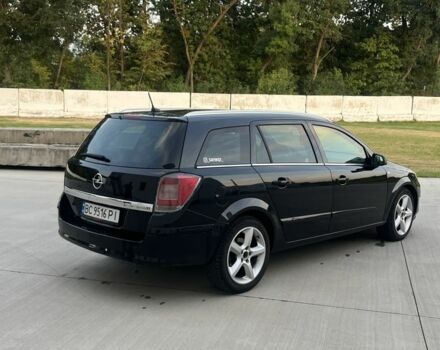 Черный Опель Астра, объемом двигателя 1.9 л и пробегом 270 тыс. км за 5200 $, фото 3 на Automoto.ua