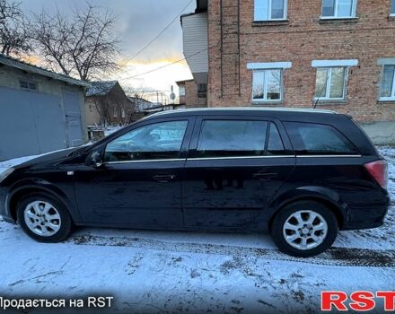 Черный Опель Астра, объемом двигателя 1.6 л и пробегом 278 тыс. км за 5700 $, фото 3 на Automoto.ua