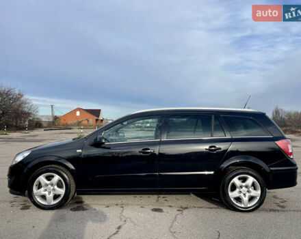 Черный Опель Астра, объемом двигателя 1.6 л и пробегом 239 тыс. км за 5350 $, фото 5 на Automoto.ua