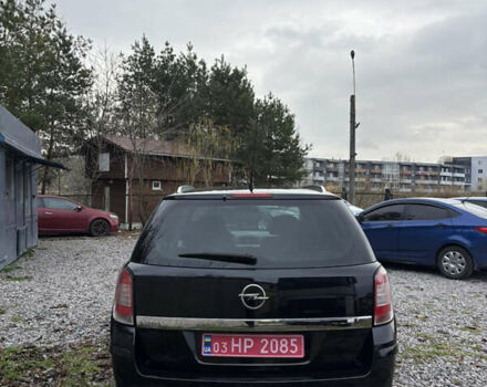 Черный Опель Астра, объемом двигателя 1.6 л и пробегом 208 тыс. км за 5600 $, фото 11 на Automoto.ua