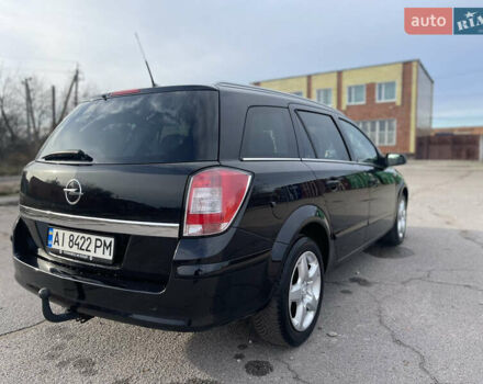 Черный Опель Астра, объемом двигателя 1.6 л и пробегом 239 тыс. км за 5350 $, фото 9 на Automoto.ua