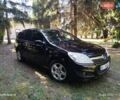 Черный Опель Астра, объемом двигателя 1.6 л и пробегом 228 тыс. км за 5800 $, фото 1 на Automoto.ua