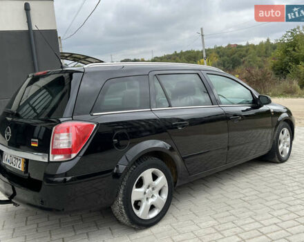 Черный Опель Астра, объемом двигателя 1.6 л и пробегом 250 тыс. км за 4399 $, фото 15 на Automoto.ua