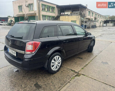 Черный Опель Астра, объемом двигателя 1.69 л и пробегом 300 тыс. км за 4500 $, фото 12 на Automoto.ua