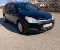 Чорний Опель Астра, об'ємом двигуна 1.6 л та пробігом 223 тис. км за 4699 $, фото 1 на Automoto.ua