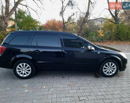 Черный Опель Астра, объемом двигателя 1.6 л и пробегом 327 тыс. км за 4400 $, фото 4 на Automoto.ua