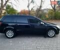 Черный Опель Астра, объемом двигателя 1.6 л и пробегом 327 тыс. км за 4550 $, фото 4 на Automoto.ua