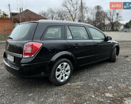 Черный Опель Астра, объемом двигателя 1.8 л и пробегом 209 тыс. км за 5600 $, фото 2 на Automoto.ua