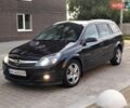 Черный Опель Астра, объемом двигателя 1.6 л и пробегом 267 тыс. км за 5400 $, фото 1 на Automoto.ua