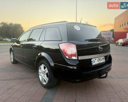 Черный Опель Астра, объемом двигателя 1.69 л и пробегом 260 тыс. км за 5550 $, фото 6 на Automoto.ua