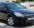 Черный Опель Астра, объемом двигателя 1.7 л и пробегом 260 тыс. км за 4700 $, фото 2 на Automoto.ua