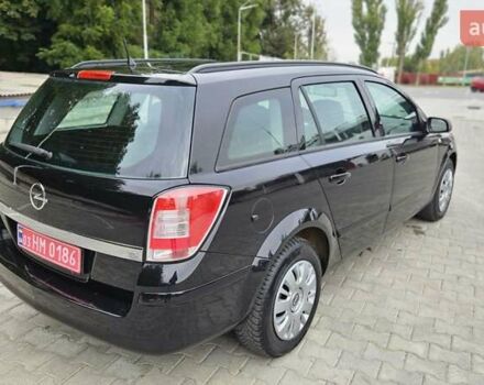 Черный Опель Астра, объемом двигателя 1.6 л и пробегом 209 тыс. км за 5850 $, фото 25 на Automoto.ua