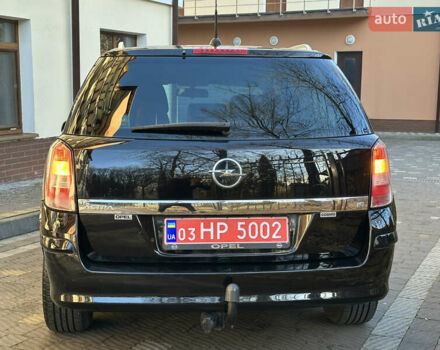 Черный Опель Астра, объемом двигателя 1.6 л и пробегом 180 тыс. км за 5499 $, фото 54 на Automoto.ua