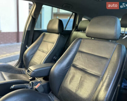 Черный Опель Астра, объемом двигателя 1.6 л и пробегом 180 тыс. км за 5499 $, фото 144 на Automoto.ua