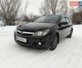 Черный Опель Астра, объемом двигателя 1.7 л и пробегом 245 тыс. км за 5800 $, фото 1 на Automoto.ua
