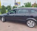 Черный Опель Астра, объемом двигателя 1 л и пробегом 194 тыс. км за 5000 $, фото 2 на Automoto.ua