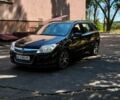 Черный Опель Астра, объемом двигателя 1.9 л и пробегом 200 тыс. км за 4498 $, фото 1 на Automoto.ua